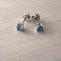 Azure Blue Topaz Solitaire Stud Earrings