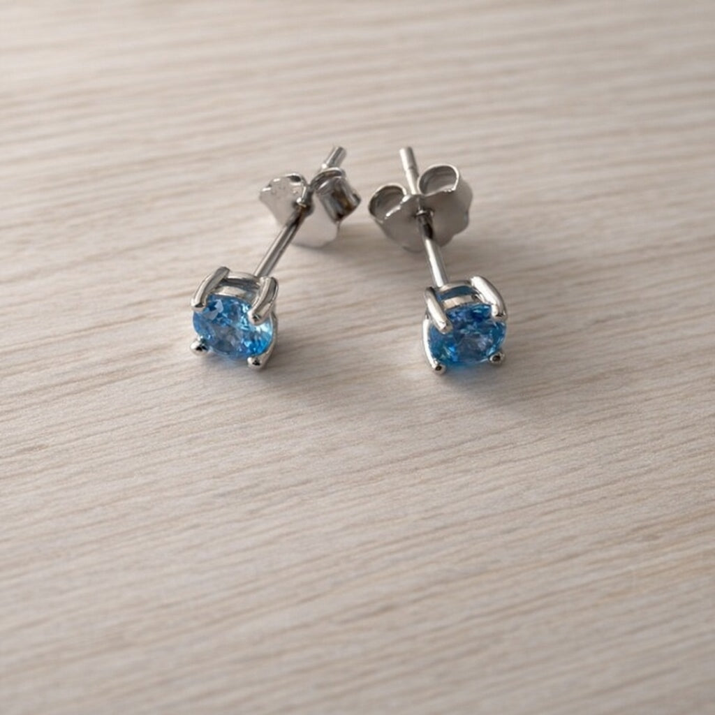 Azure Blue Topaz Solitaire Stud Earrings