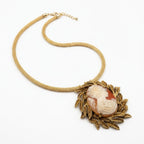 Vintage Cameo Necklace with Ornate Leaf Frame