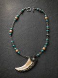 Primal Tooth Amulet